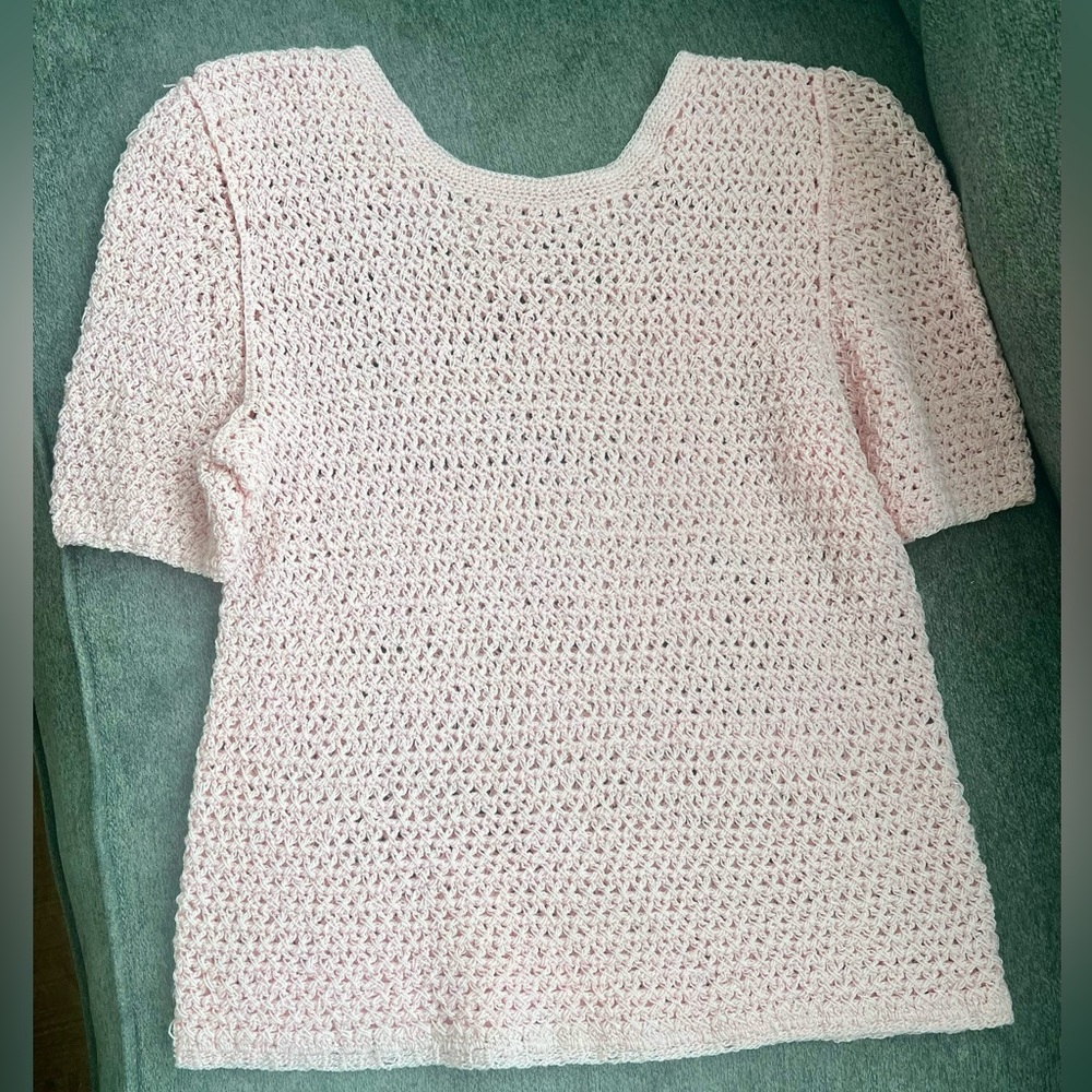 Pink knitted sweater